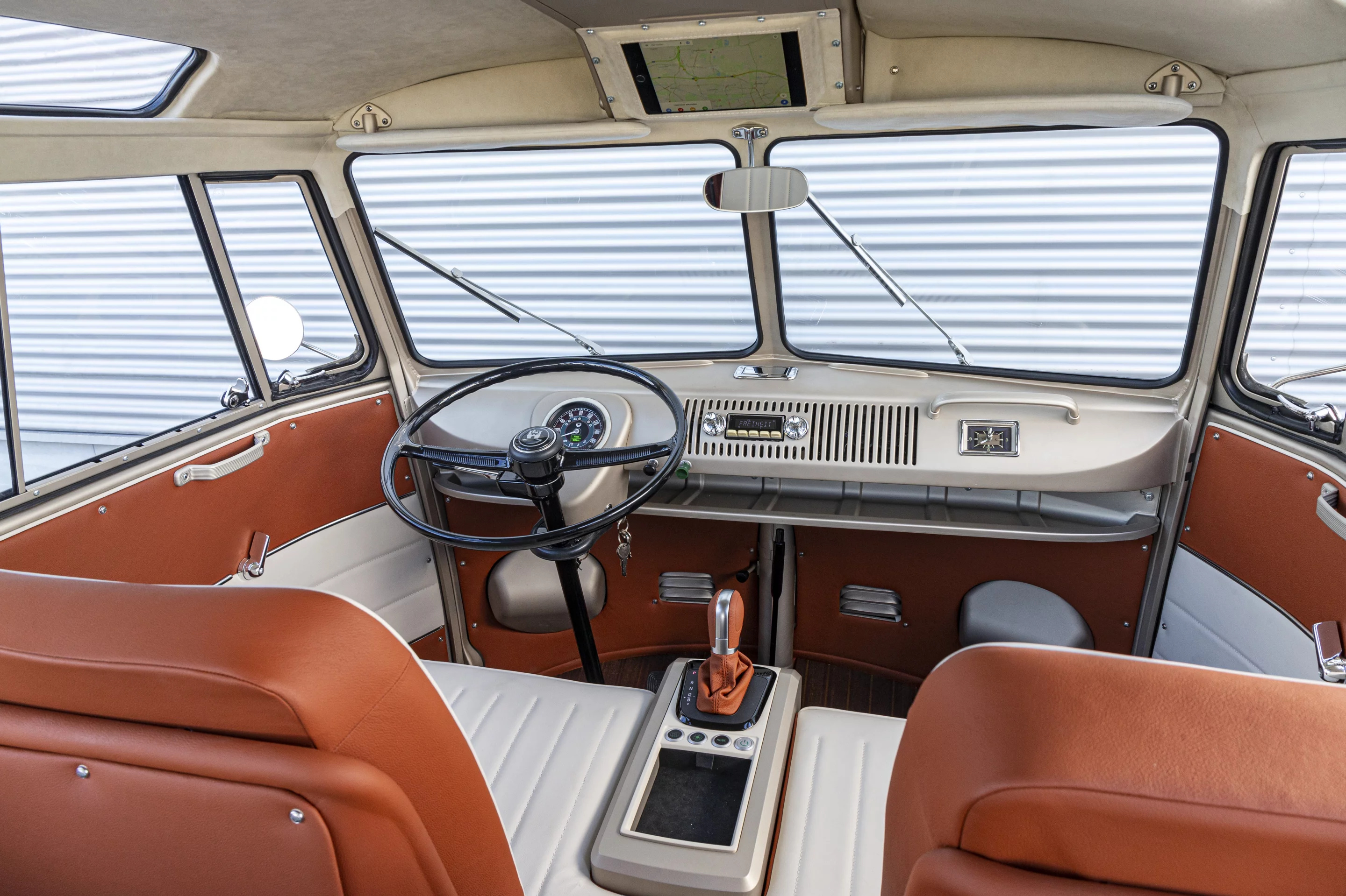 The old-school tape deck is actually a Bluetooth head unit. And how's that steering wheel!