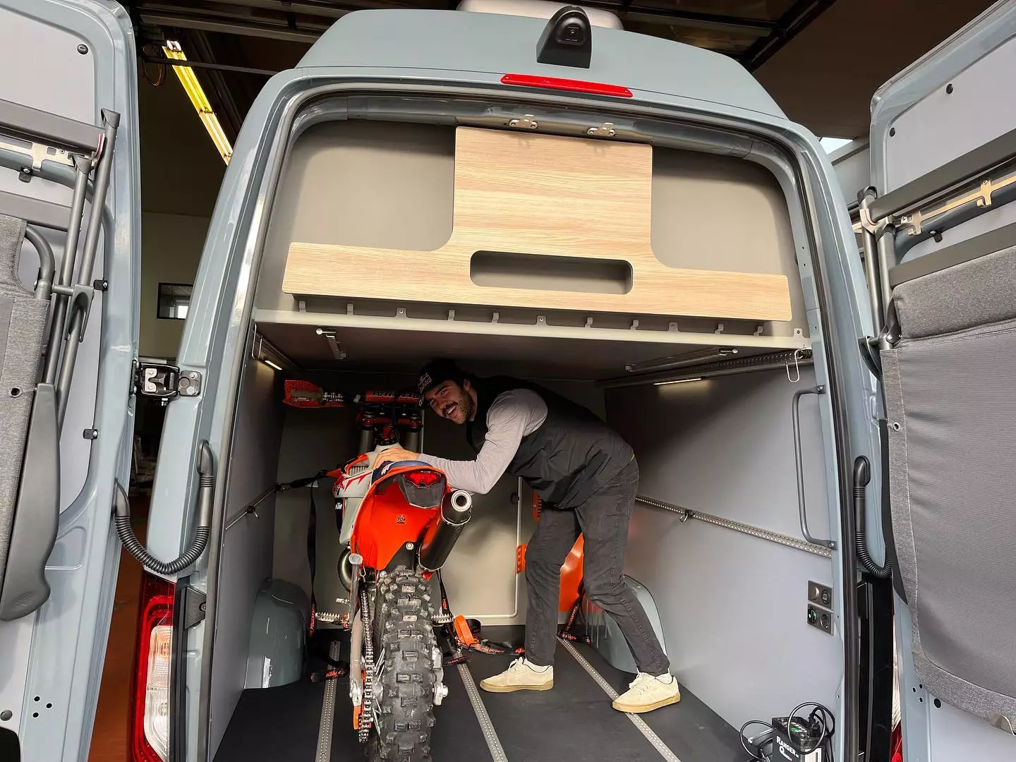 Alphavan deletes some of the FlexPort equipment and trim and adds in a bike-loading layout