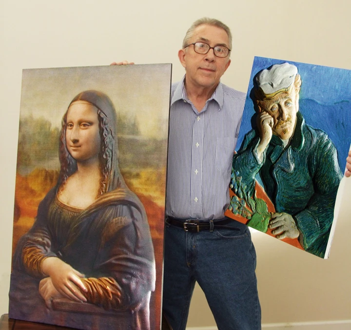 3DPhotoWorks Co-Founder John Olson holding 3D Tactile Fine Art Prints by 3DPhotoWorks