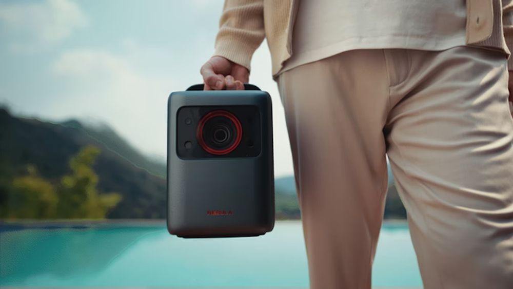 The Nebula Cosmos Laser 4K projector tips the scales at 10.7 lb and sports a sturdy carry handle for portability