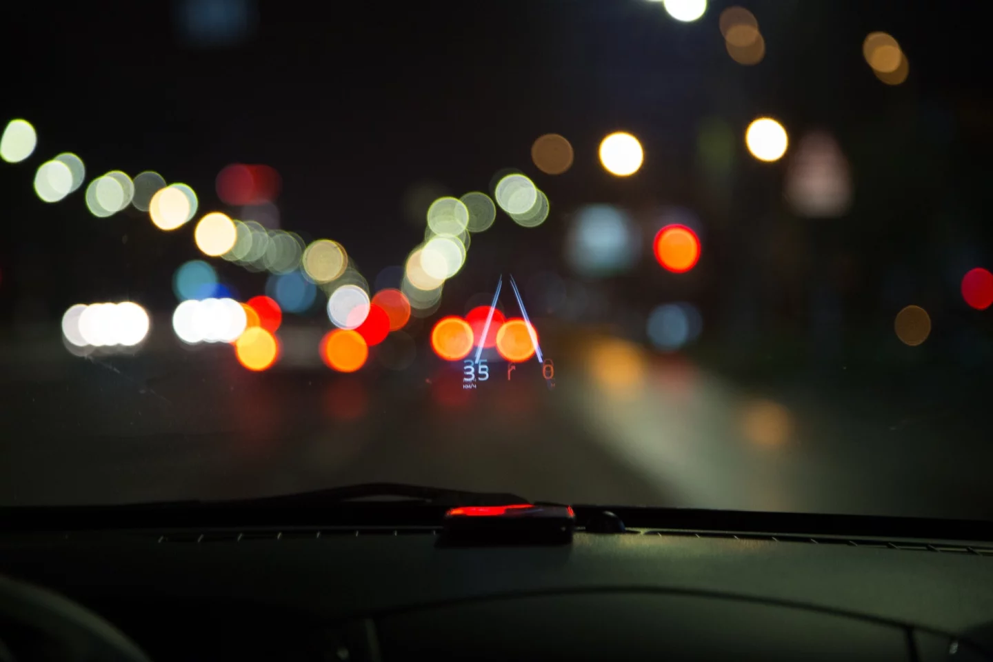 Everything is displayed upside-down and backwards, so that it appears right-side-up and forwards when reflected onto the windshield