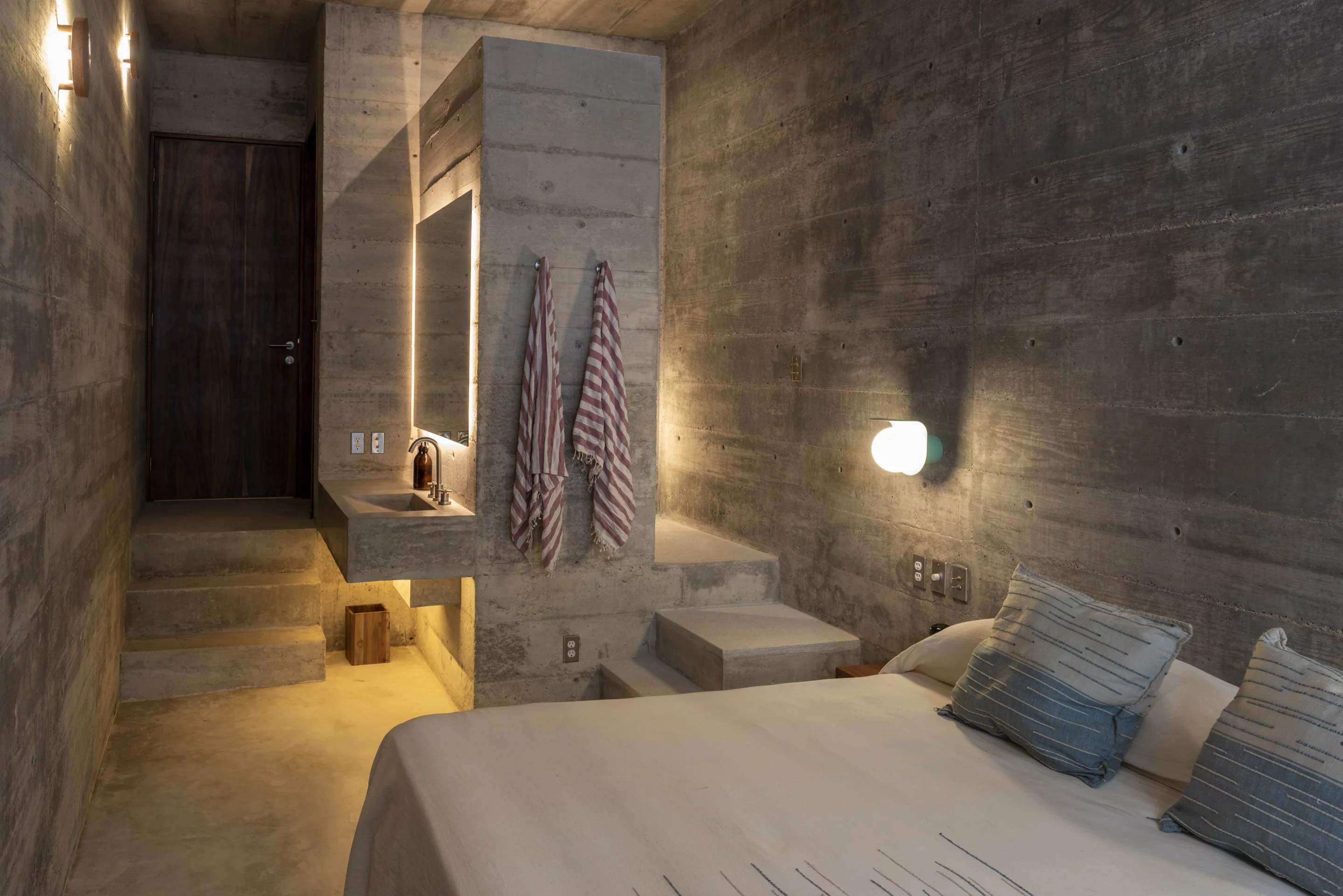 Casa TO features a collection of nine bare-boned concrete suites