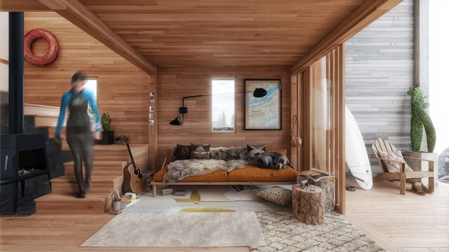 Interior of the The Surf Shack from Backcountry Hut Company, a prefab home with an open interior layout and generous glazing
