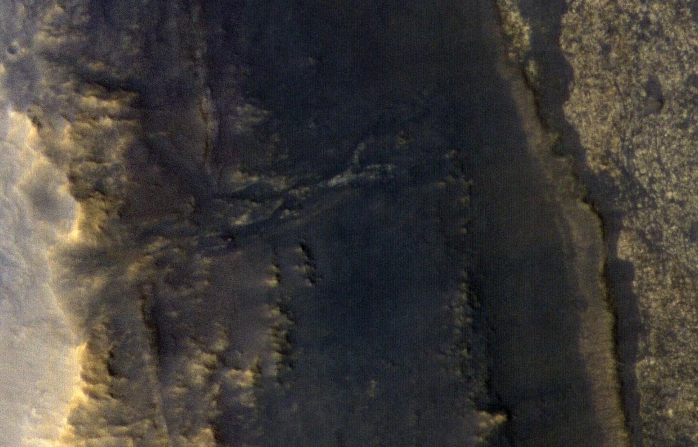 Opportunity is a small dot in the valley on the middle left of the image