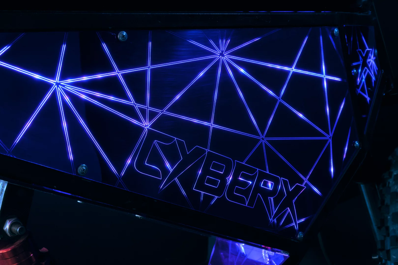 The LED-lit laser-printed acrylic body panels give the CyberX a look of its own