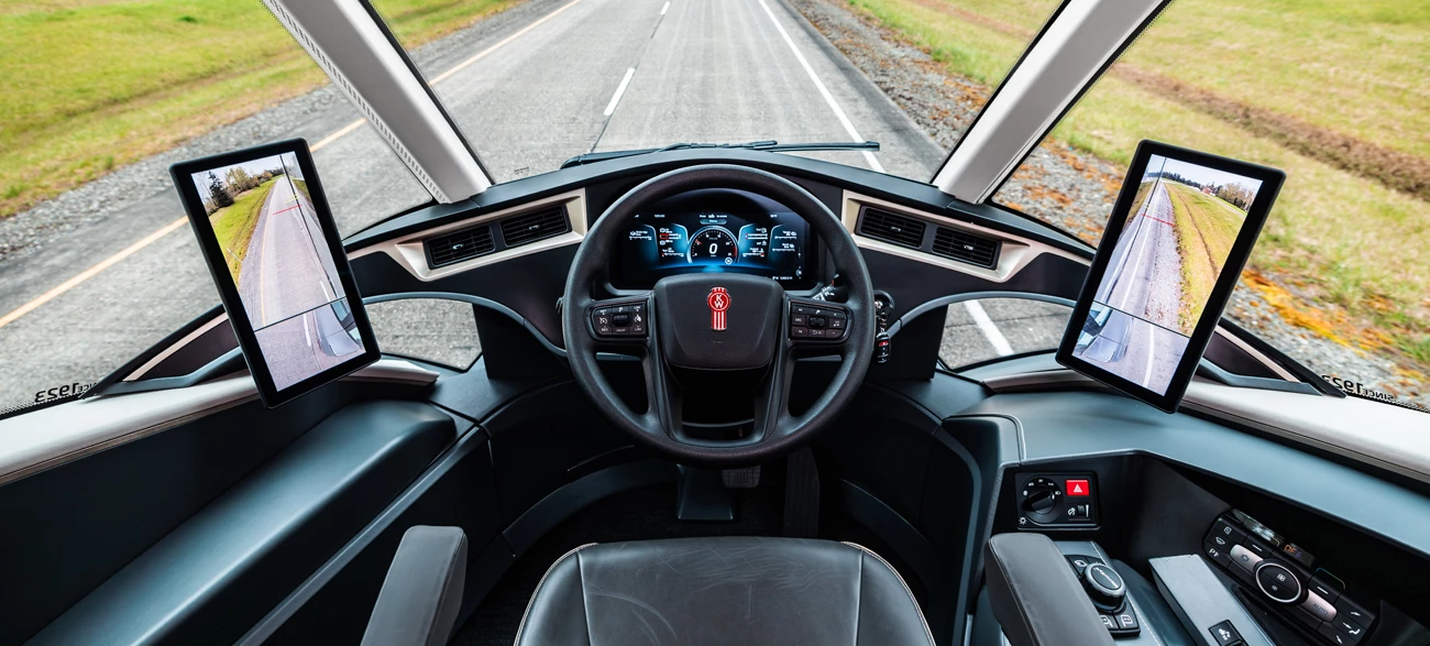 Central cockpit with huge rear-view camera screens either side