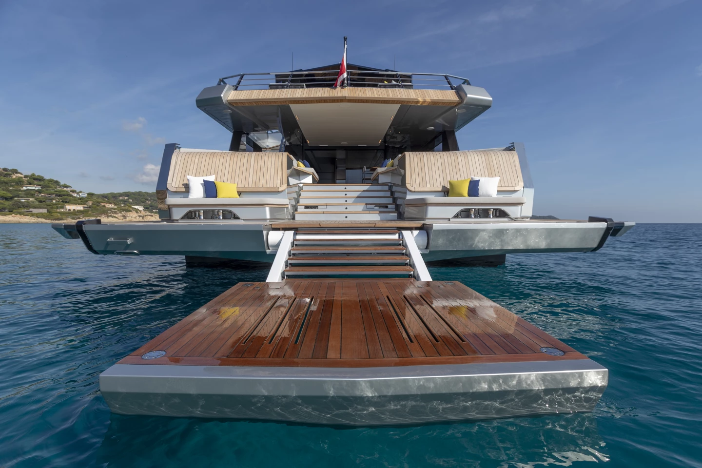 The bulwark transforms into a luxury outdoor terrace over the water