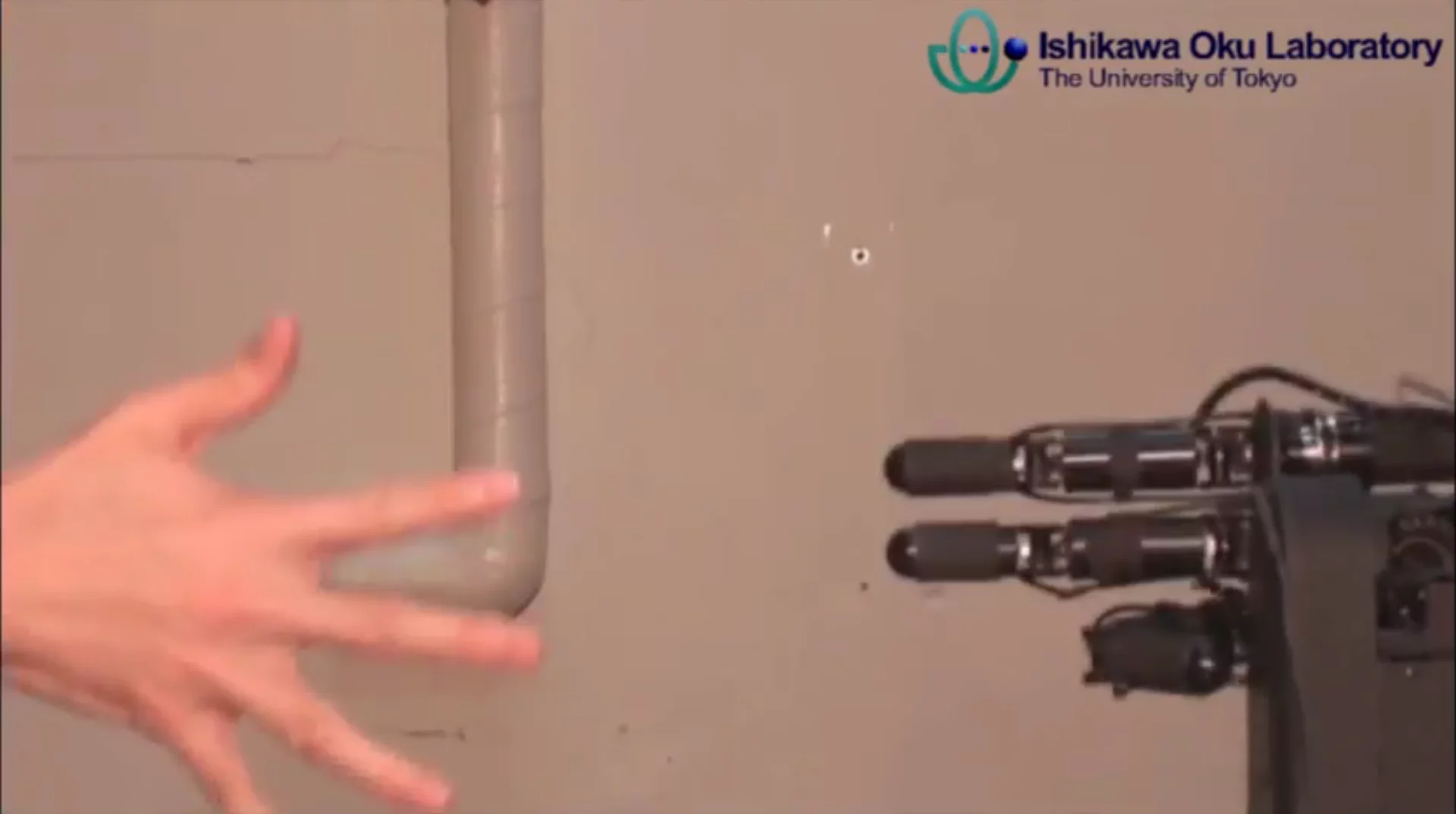 Strictly speaking that should be robot hand and eye, since, as you might have guessed, it uses a high speed vision system that identifies, within a millisecond, the move being made by the human player from the shape of their hand