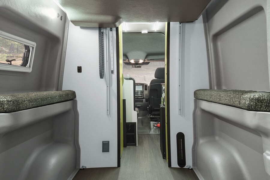 When the bed lifts out of the way, the Winnebago Revel offers plenty of room for bikes and other gear