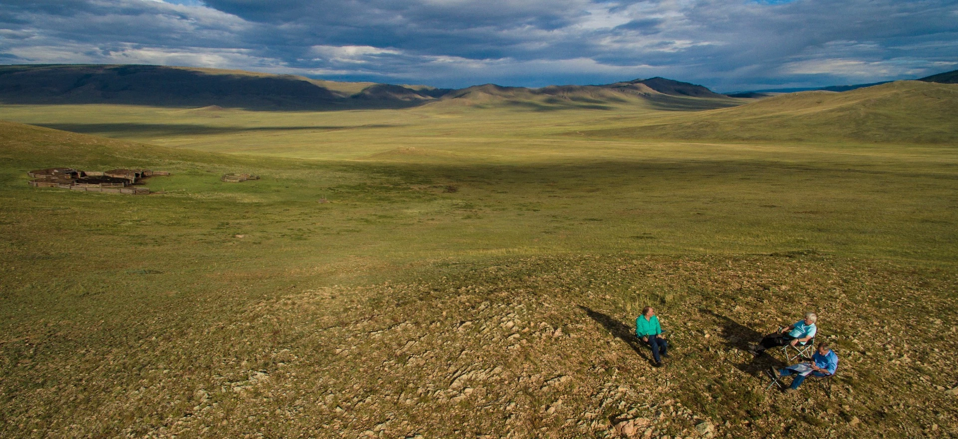 Richard Thwaites, Charlie Nott and Tim Brougham have a few G&Ts at our spectacular saddle camp near Tudevtey
