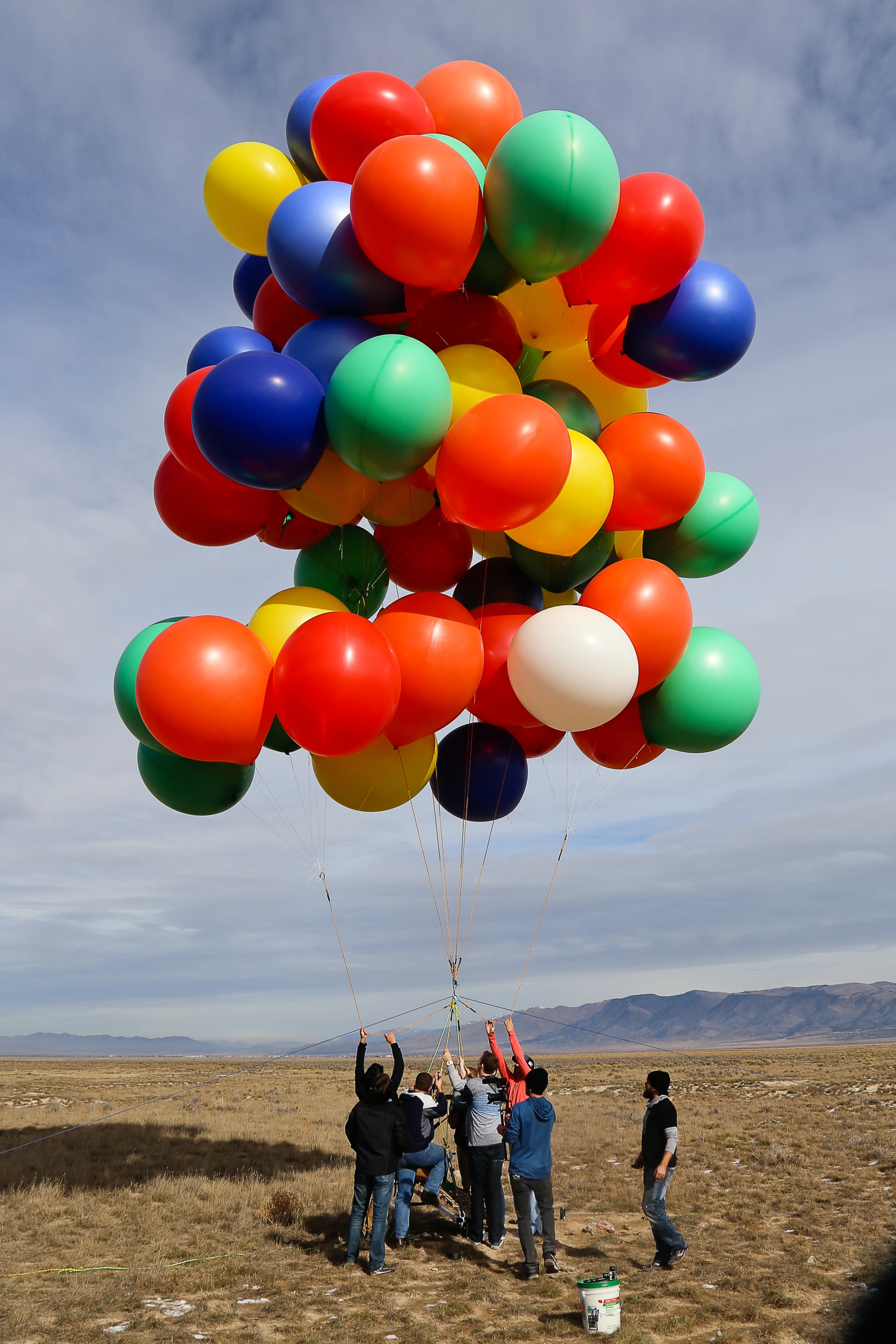 A third group of balloons is added to the sun lounger