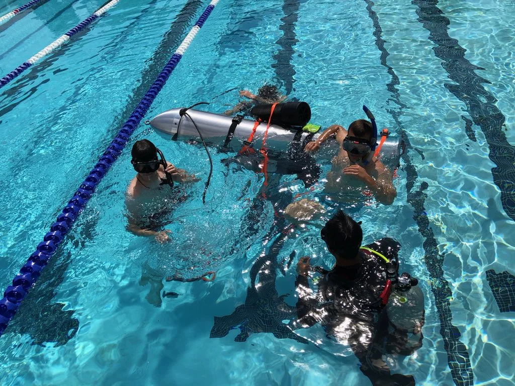 The mini submarine built to rescue the boys trapped in a Thai cave undergoes testing in an LA pool