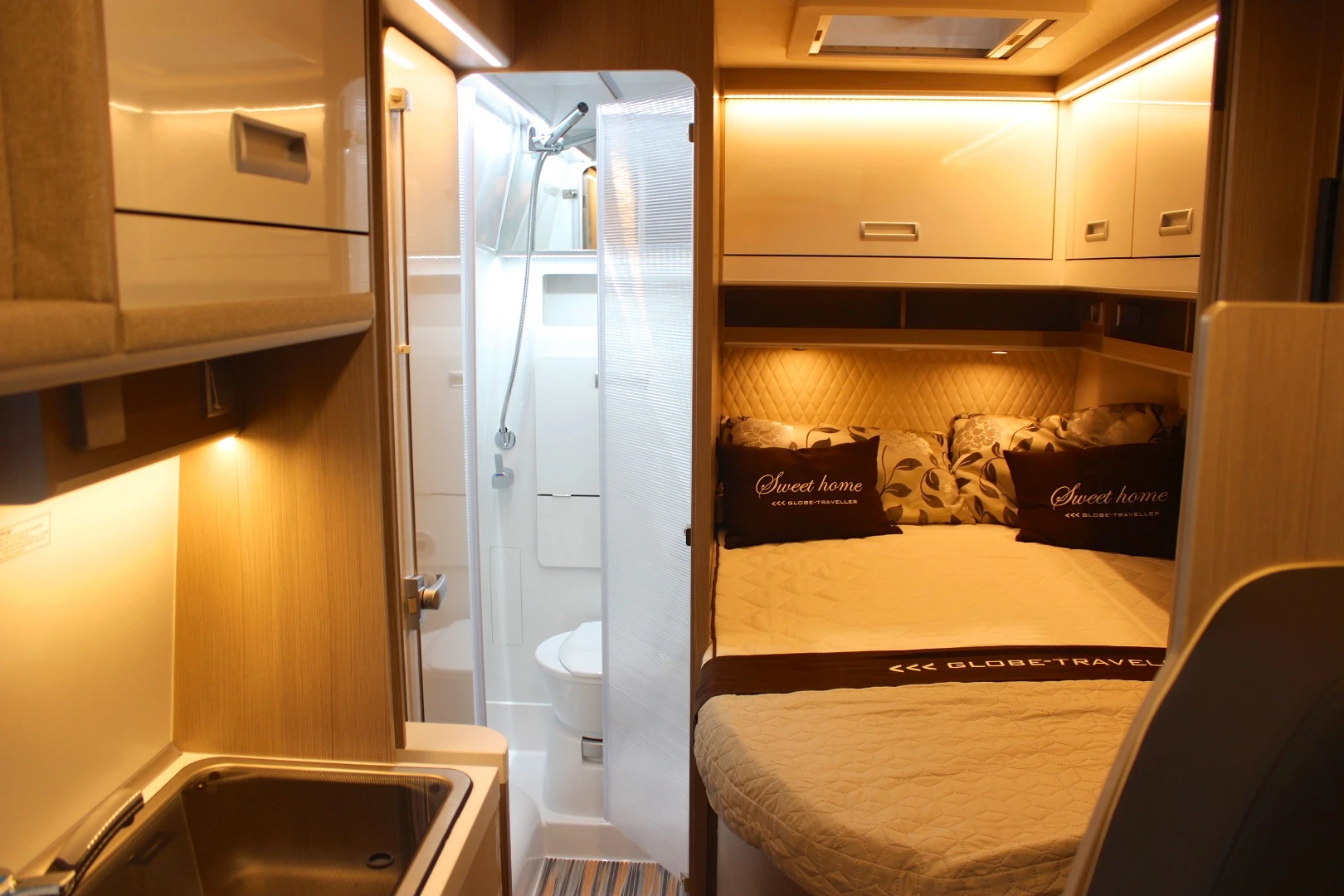 Globe Traveller's Voyager XS floor plan feels a little like a larger motorhome, complete with rear bedroom and accompanying bathroom