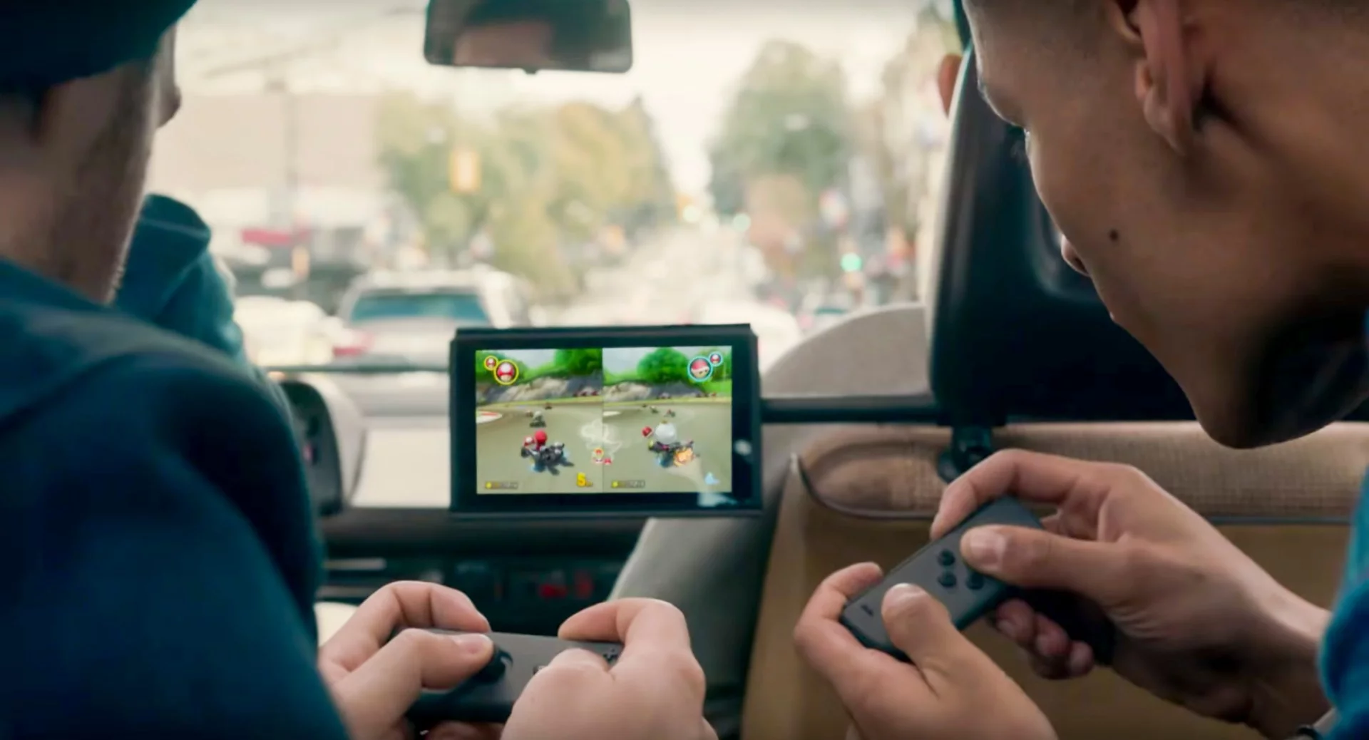 Nintendo using a couple of van-laden millennial gamers racing in Mario Kart on Switch