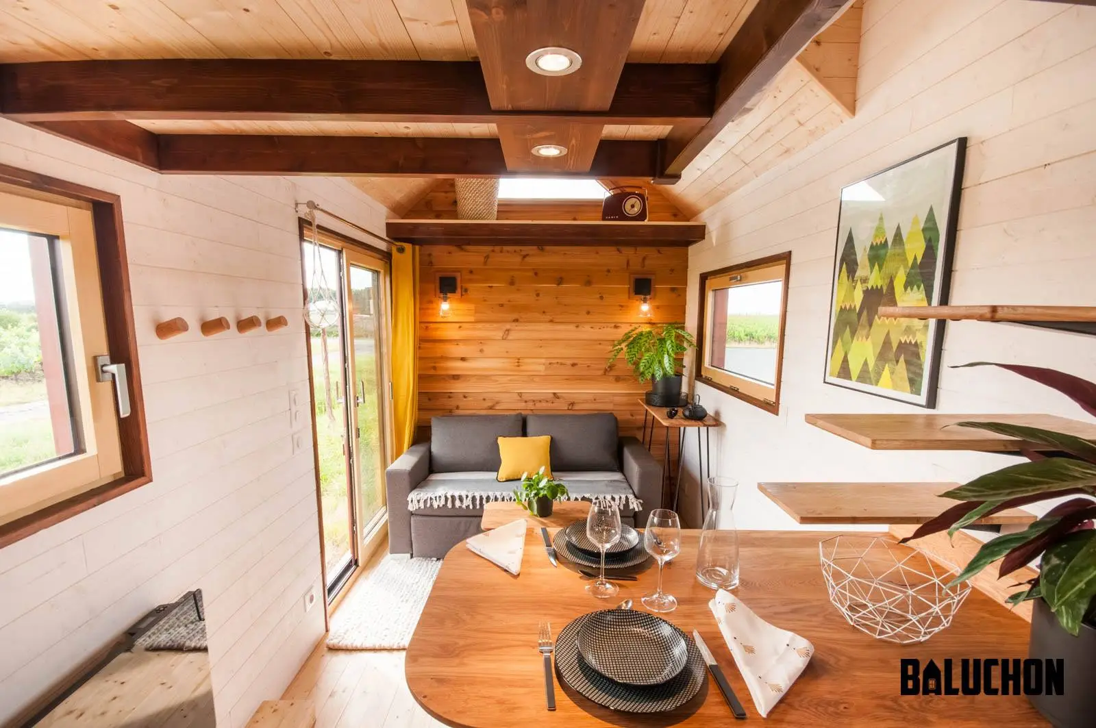The Pampille's ground floor includes a living room, dining area, kitchenette, and bathroom
