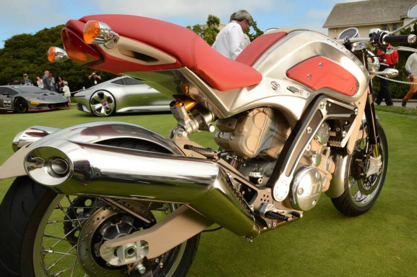 The ingenious canting of the Midual motor enables the rear cylinder to clear the swinging-arm pivot.