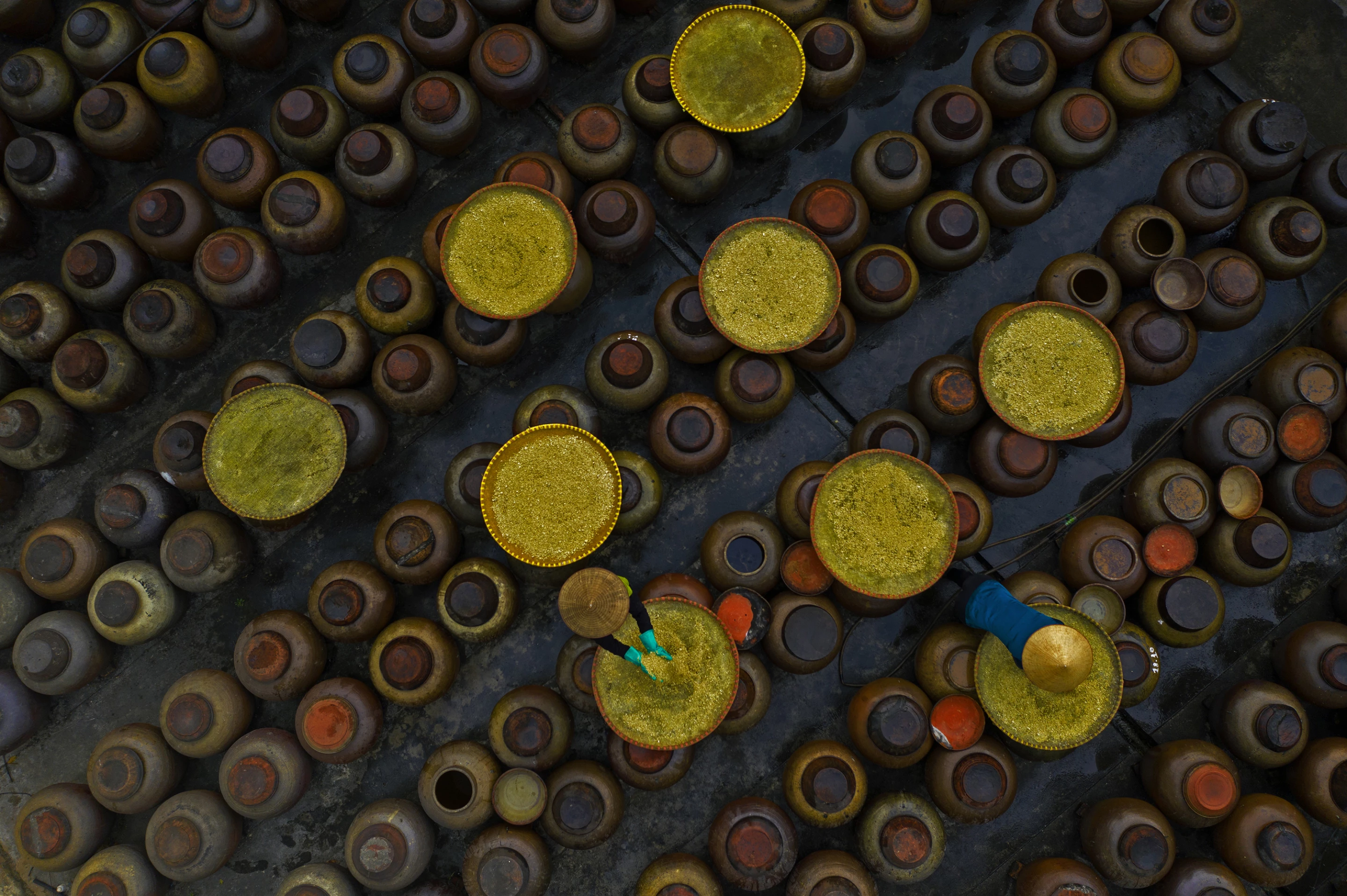 Honorable Mention - Making Soy Sauce. Cu Da in Hanoi, Vietnam, where villagers have been making soy sauce since its founding more than 400 years ago