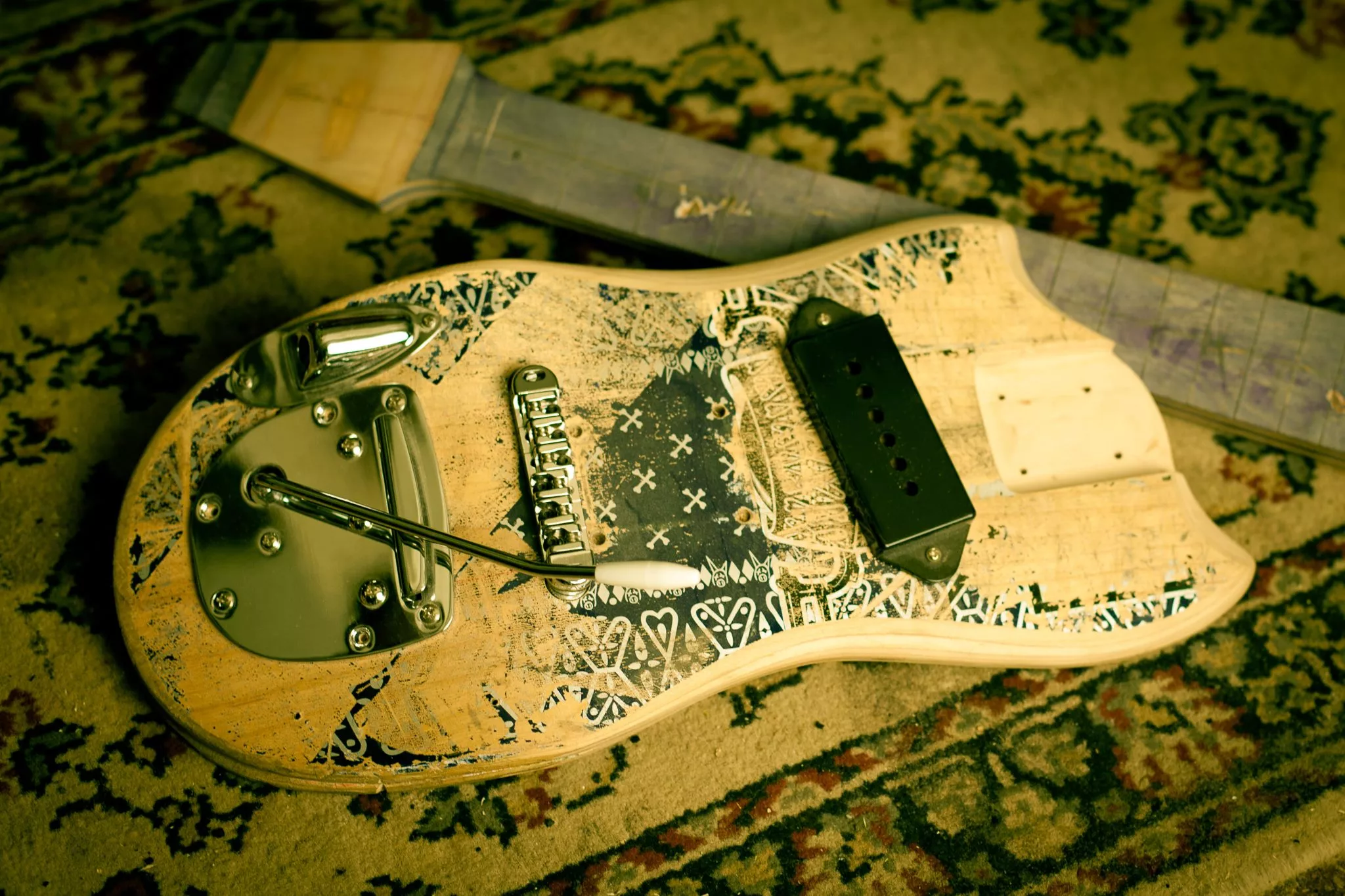 Sizing up a repurposed skateboard deck for some new hardware