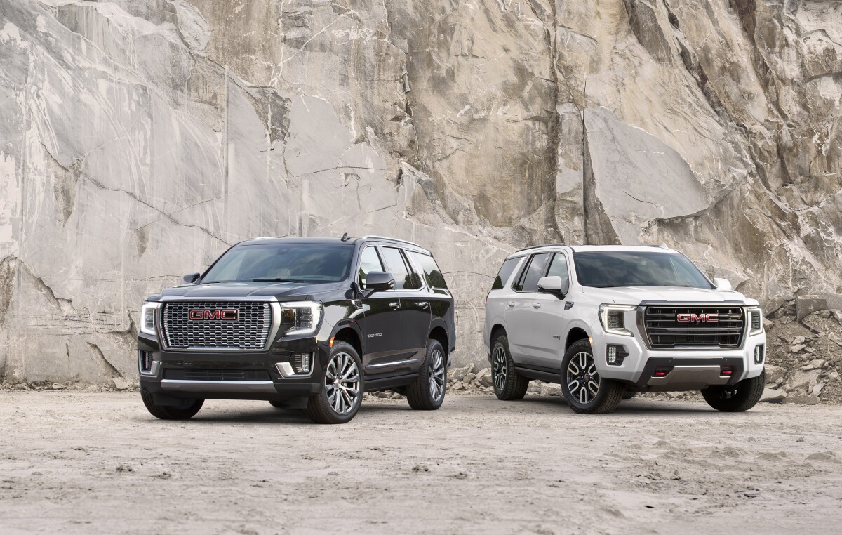 More details on the 2021 GMC Yukon will be made available closer to its production (Denali shown at left, AT4 at right)