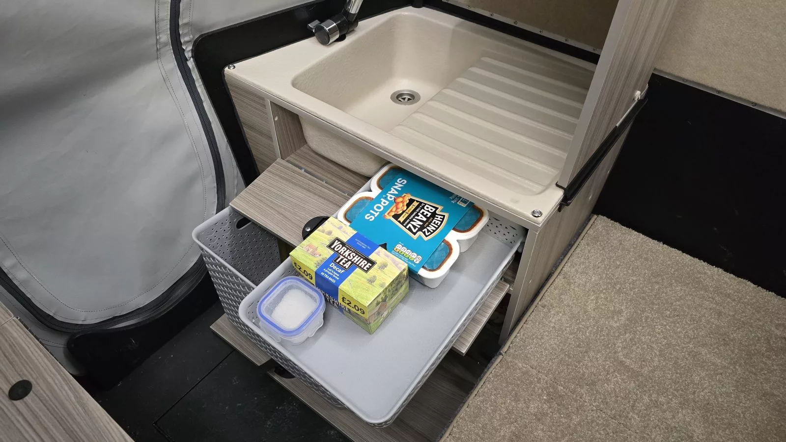 Interior under-sink storage sppace