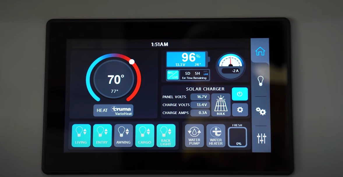 Pleasure-Way mounts an indoor touchscreen on the wall next to the bathroom and an outdoor touchscreen on the outside wall of the fridge stand