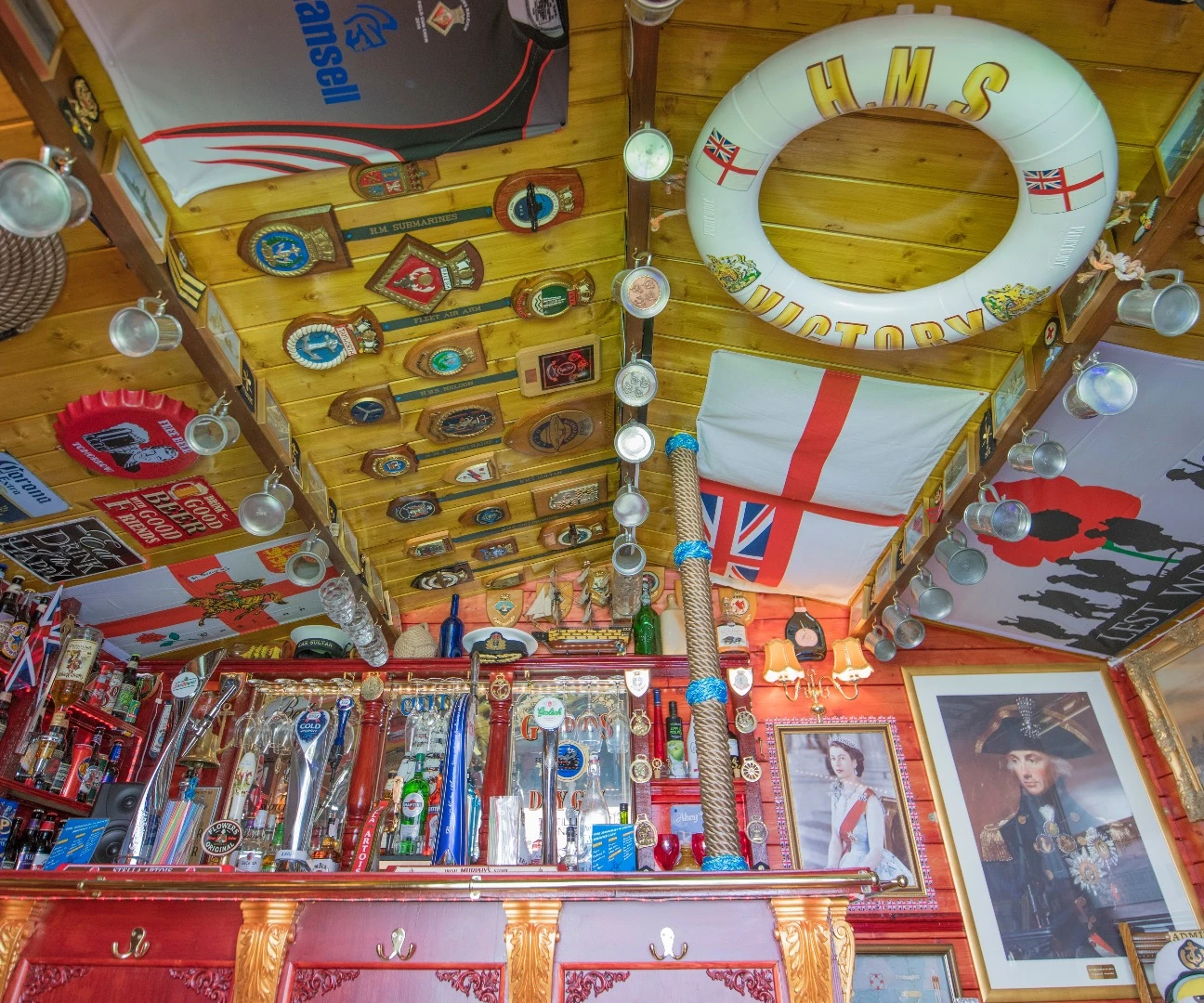 Drawing on his 17 years of experience in the Royal Navy, Carrie used the Admiral's Head sign as the driving influence behind the theme of his shed/pub