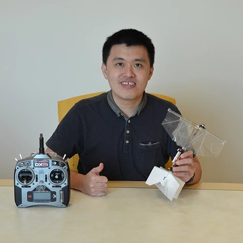 Study author Dr Yao-Wei Chin with the new swift-inspired flapping wing drone prototype