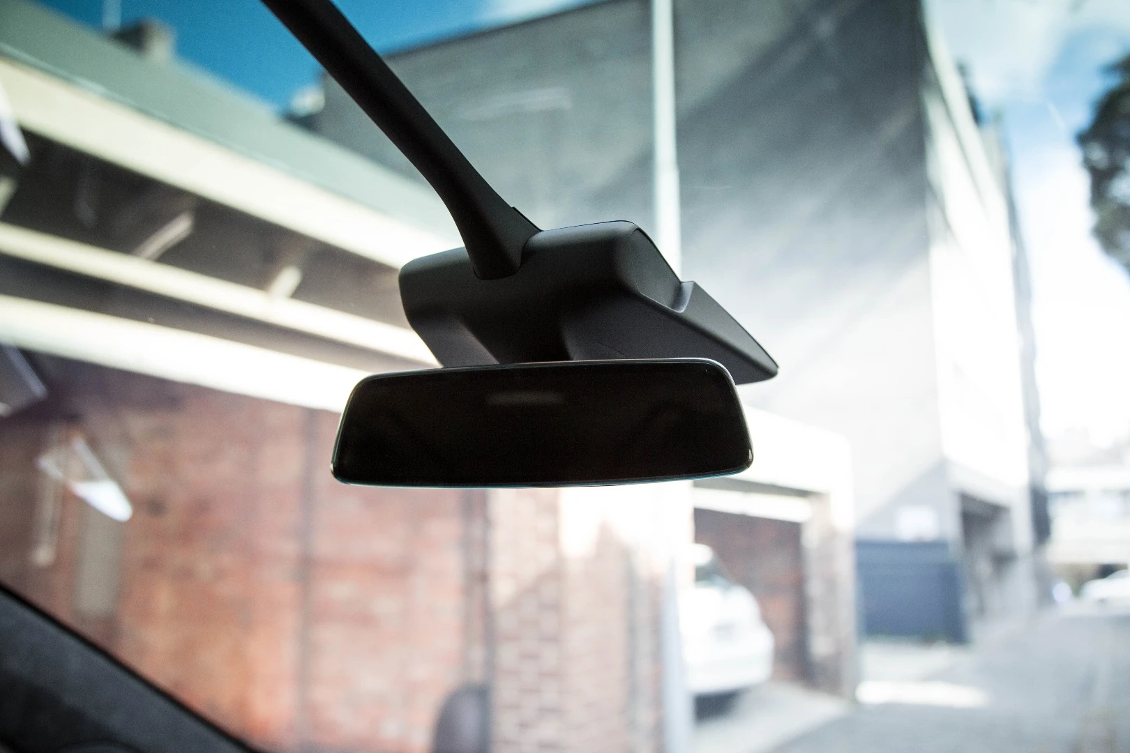 The rear-view mirror on the Model X sits in the middle of a massive, panoramic windscreen
