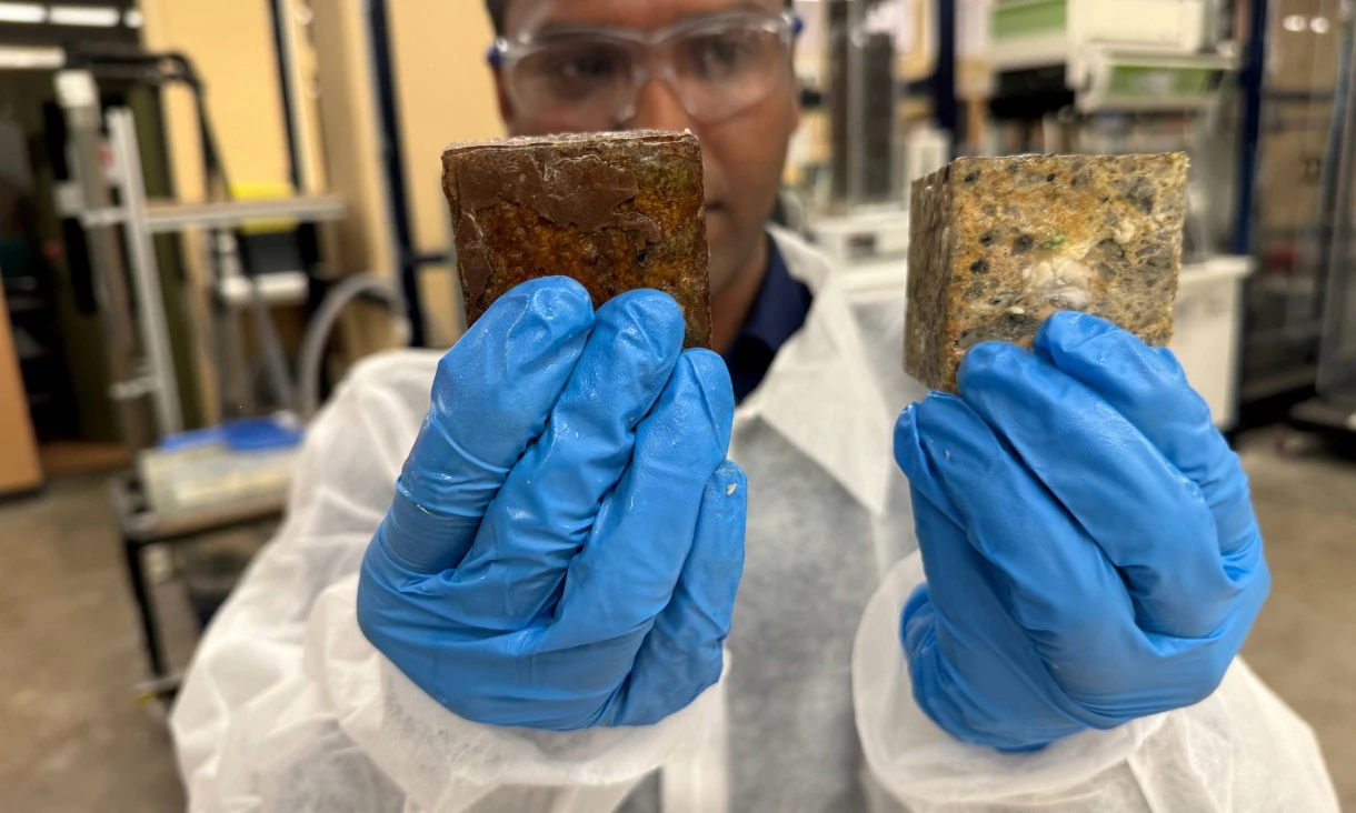 A concrete block with anti-fatberg coating (left) and an uncoated block covered in white blobs of congealed grease (right) after 30 days in a simulated sewer setting