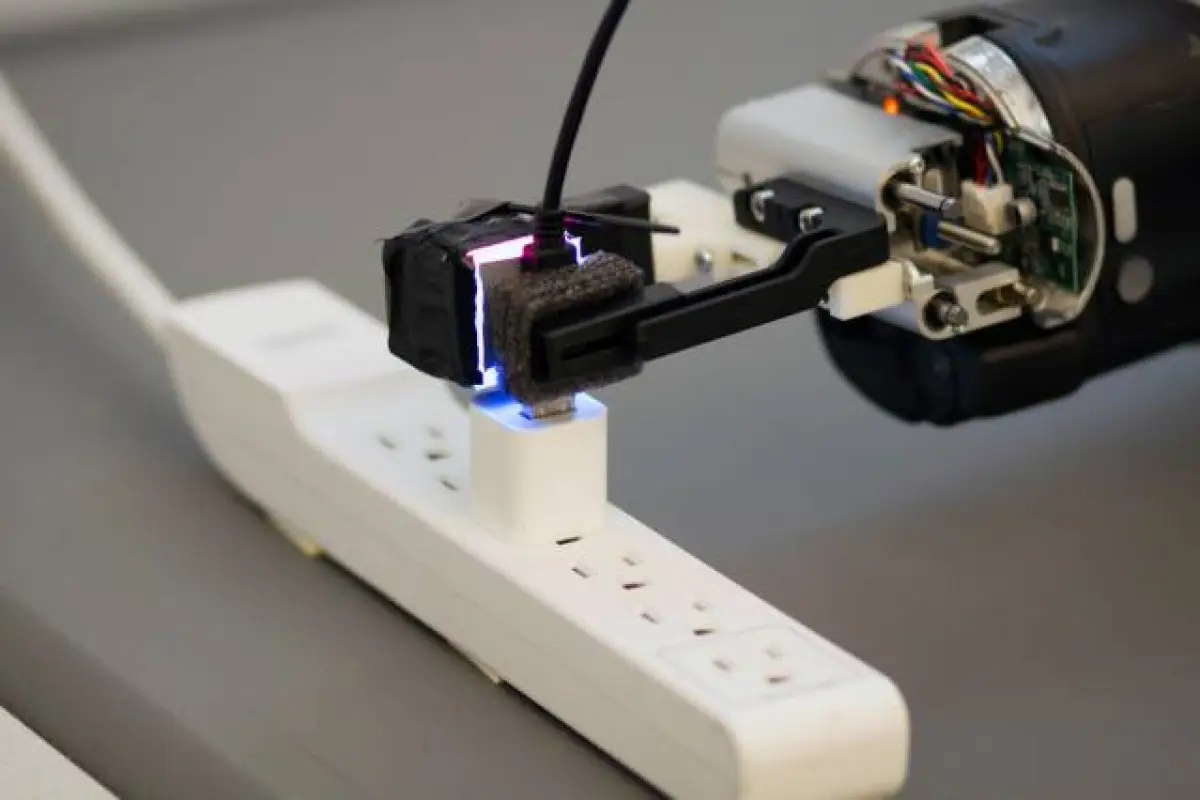 Using a GelSight sensor on one of its pinchers, a Baxter robot is able to guide a USB plug into a socket