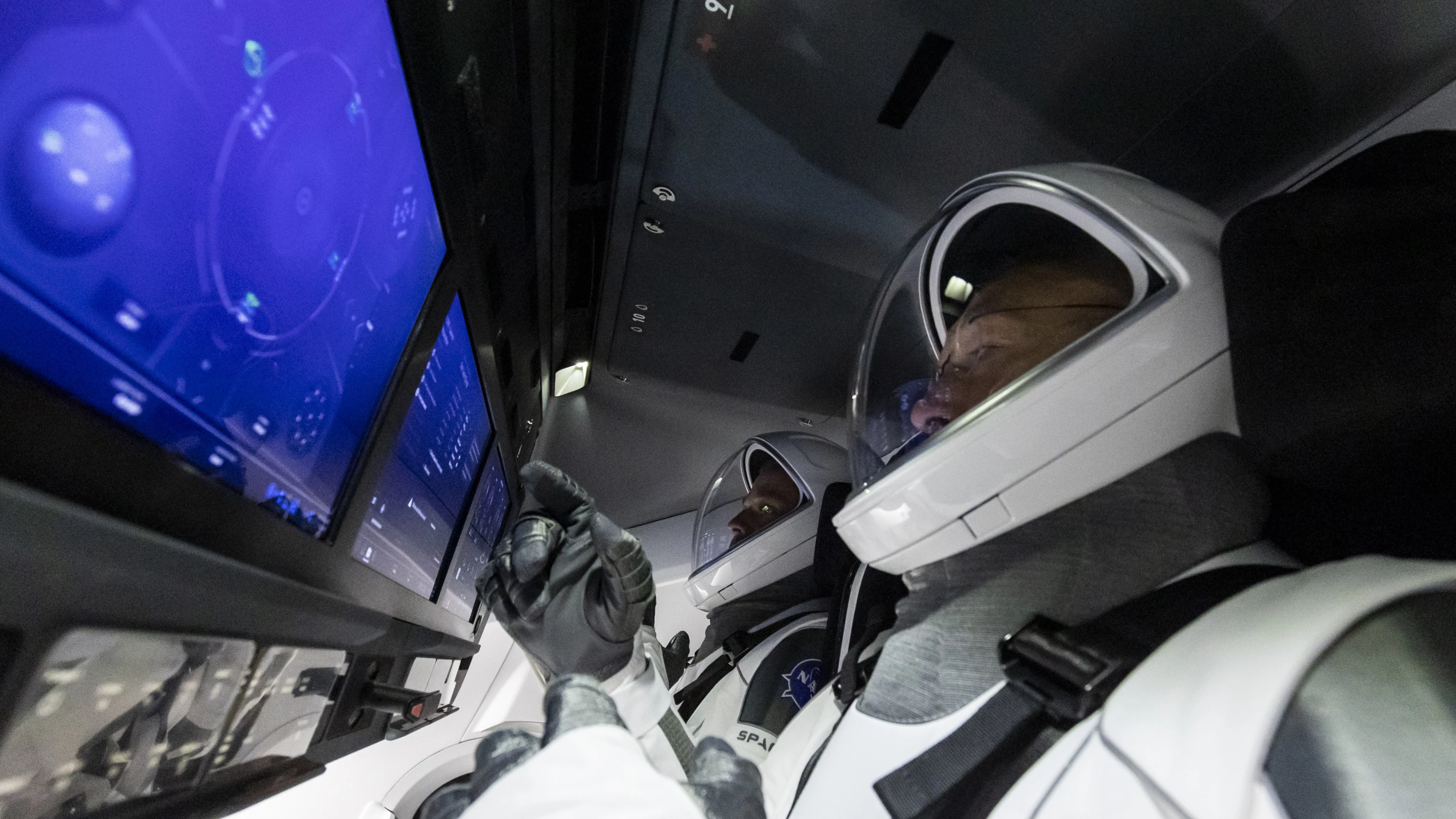 Commander Douglas Hurley and joint operations commander Robert Behnken prepare for this week's launch