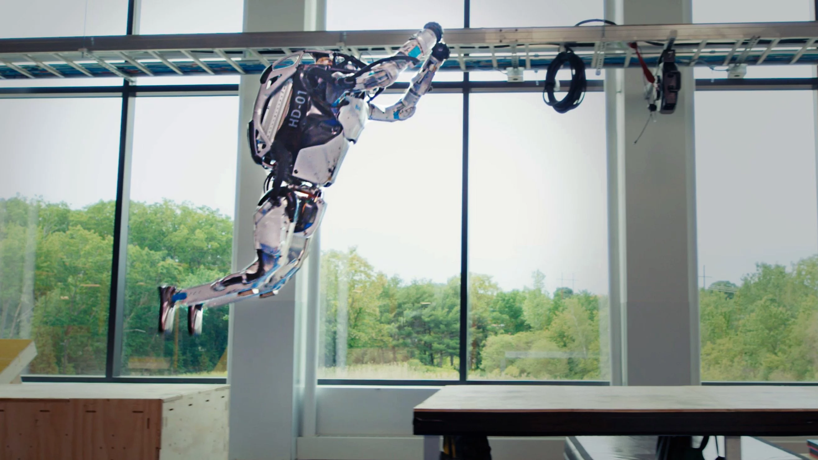 Two new videos offer the most complex Atlas parkour routine to date and take us behind the scenes of this influential robotics company