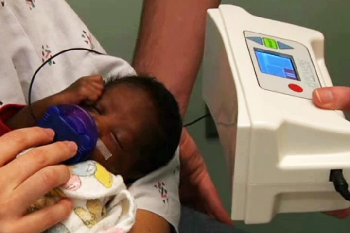 The Pacifier Activated Lullaby (PAL) device uses a specially wired pacifier and speaker to play a gentle, soothing lullaby when the infant sucks on it properly