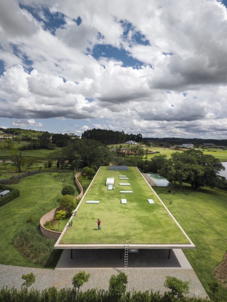 Planar House's green roof features solar panels