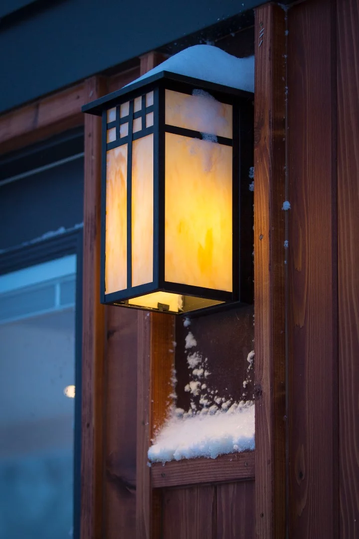 The tiny home is clad in handsome clear cedar siding