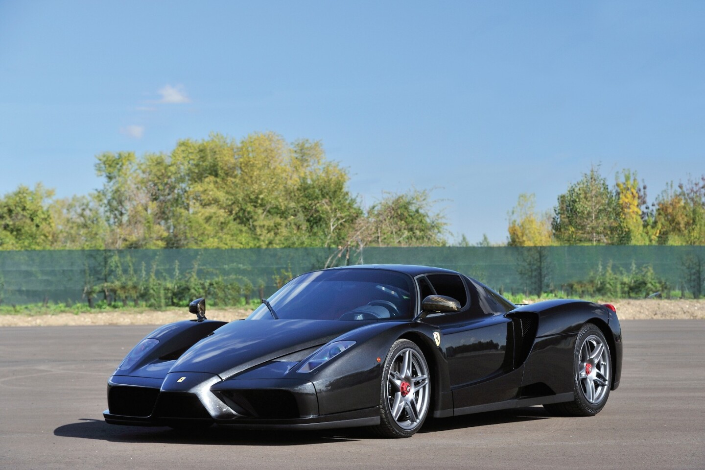 This 2004 Ferrari Enzo has an estimated price of $1,635,000 to $2,180,000