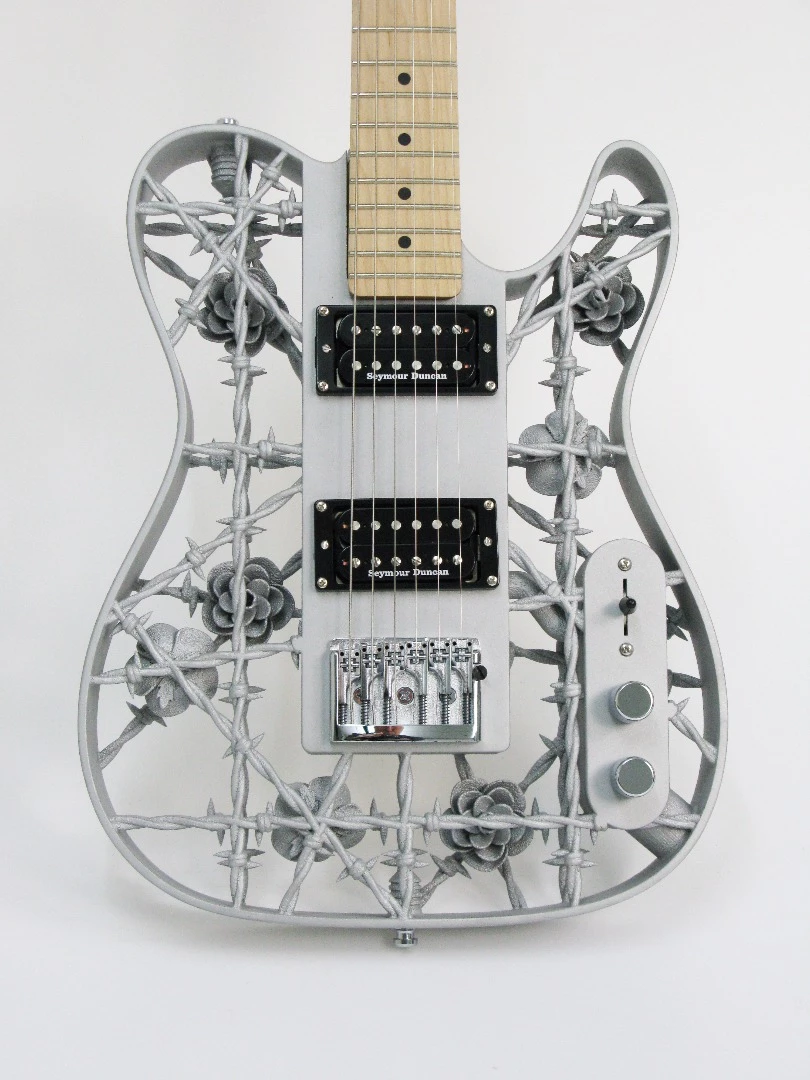 The aluminum body is wrapped around a maple inner core