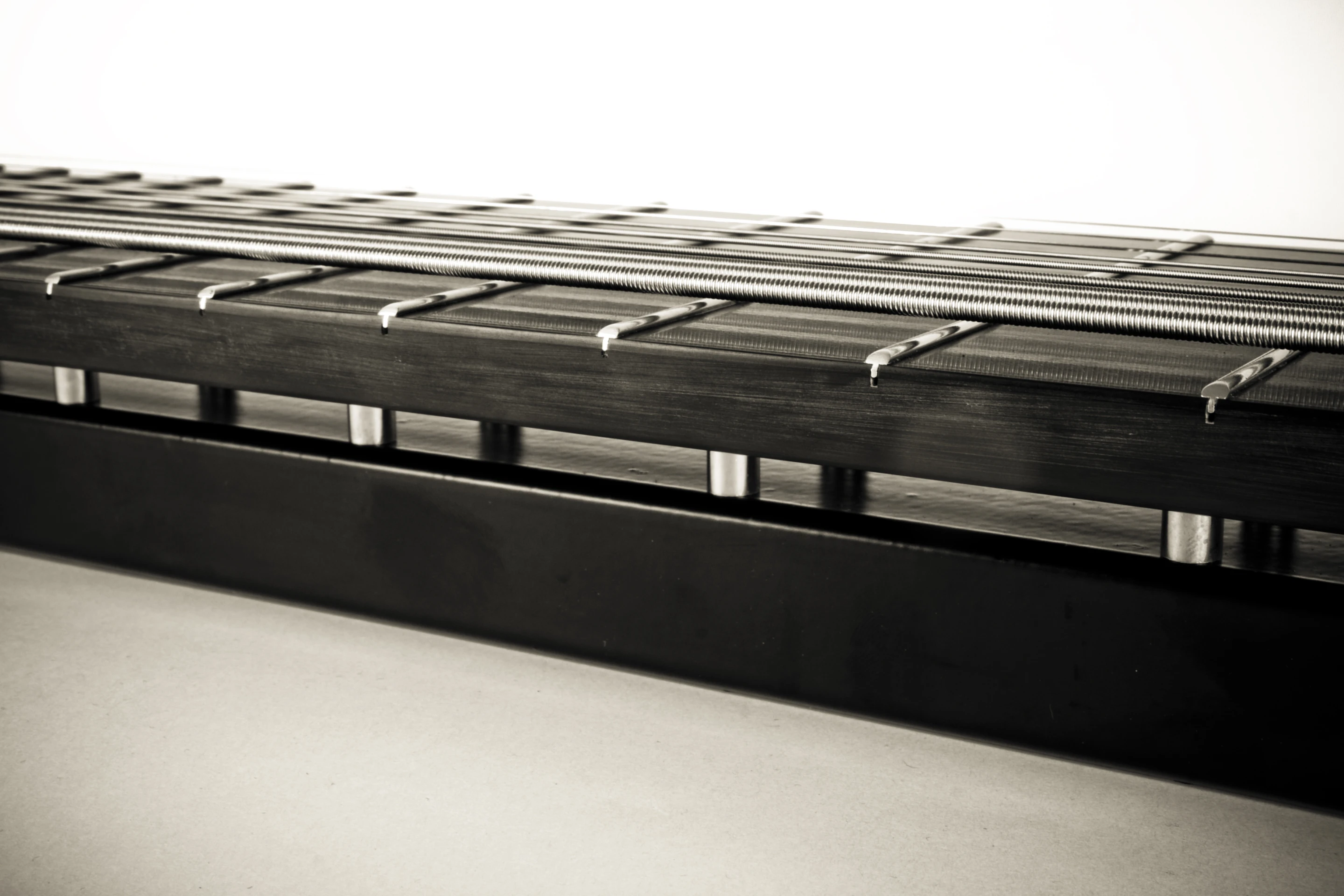 Although Kelstone can be used for metal on metal slide, its relatively low action opens up many more opportunities over its 26 frets