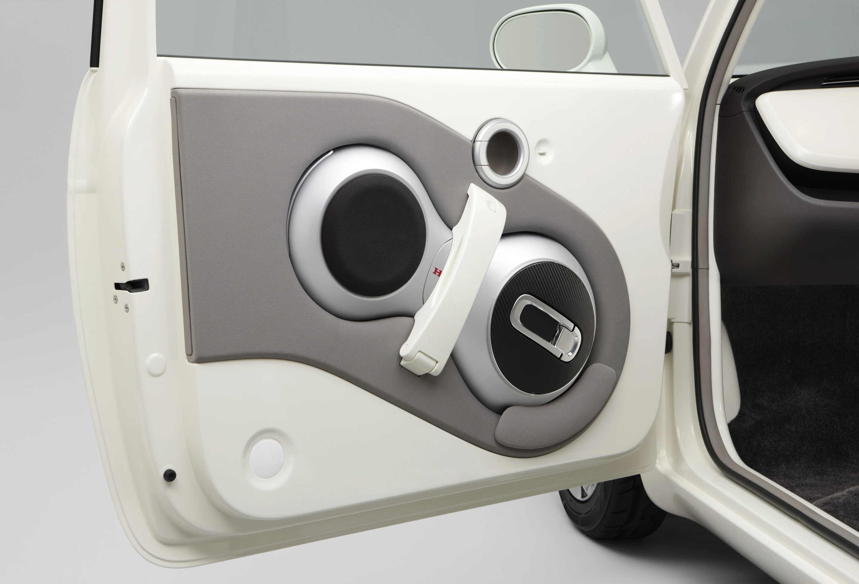 Honda's U3-X is seen as an ideal last-mile transportation device, small enough to reside inside a door