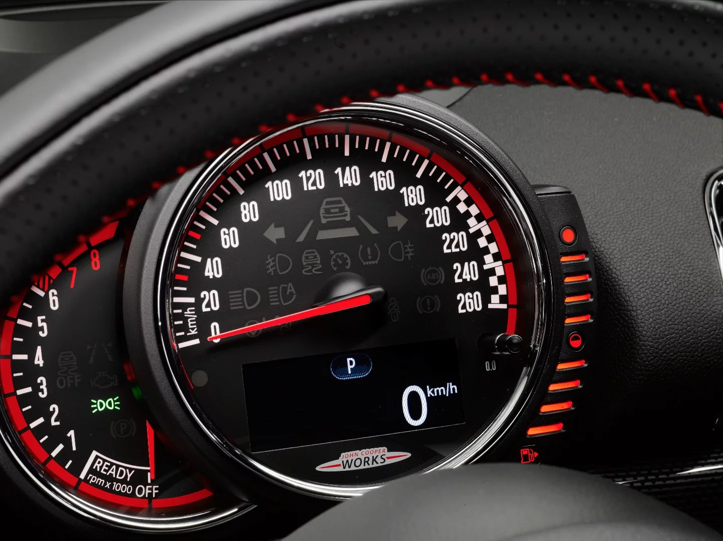 The instrument cluster is all MINI with a few touches to denote the John Cooper Works engine upgrade through the small bevel details seen here