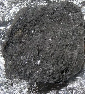 Typical meteorite fragment.