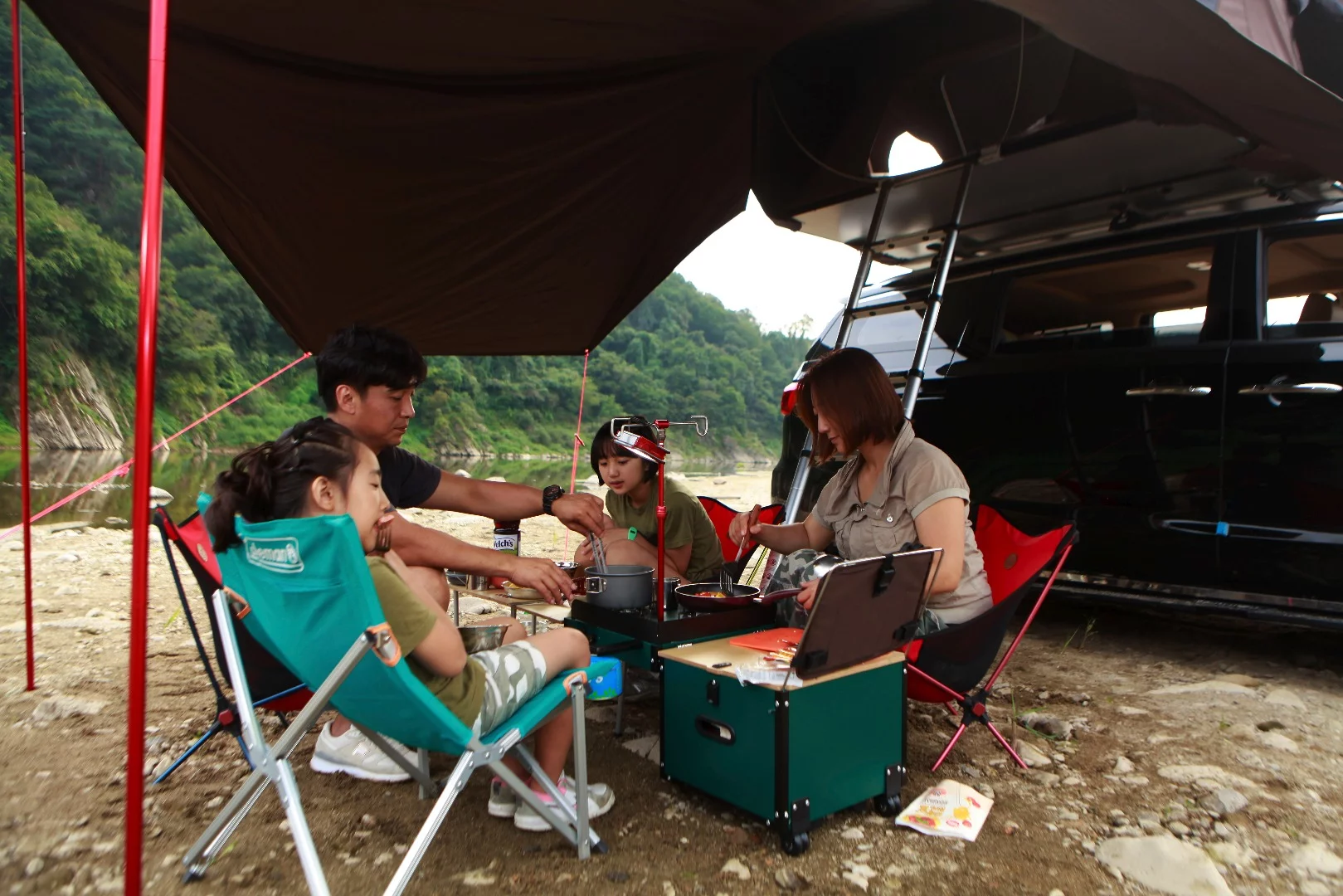 The available awning provides shelter for sitting, cooking, dining and more