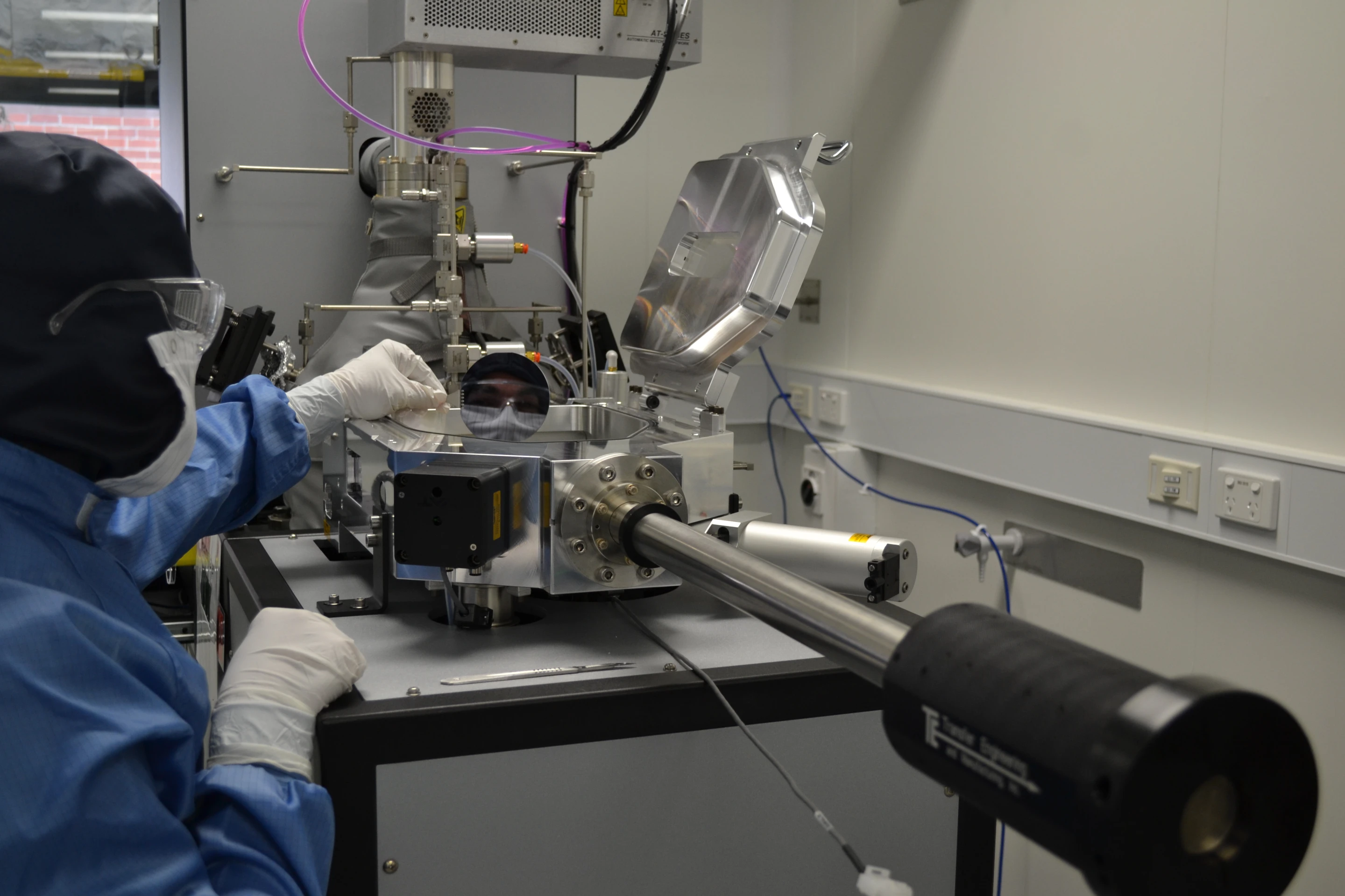Lachlan Hyde works with one of two ALD systems at Australia’s Melbourne Centre for Nanofabrication (Photo: MCN)