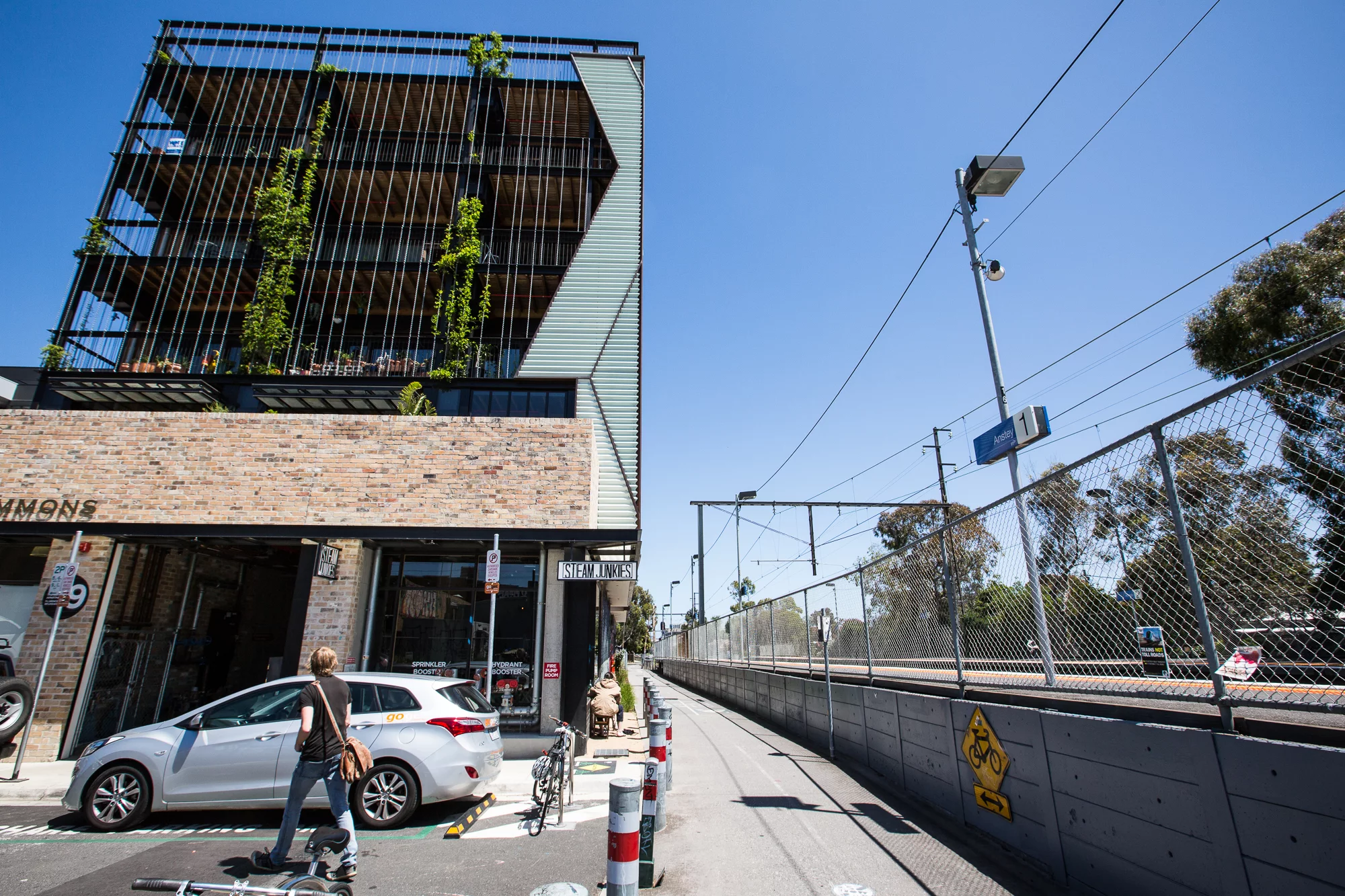Residents enjoy a ten-step wander to bike path connected to the city's network, 20 steps to the train platform and a block to trams bound for the city center (Photo: Nick Lavars/Gizmag.com)