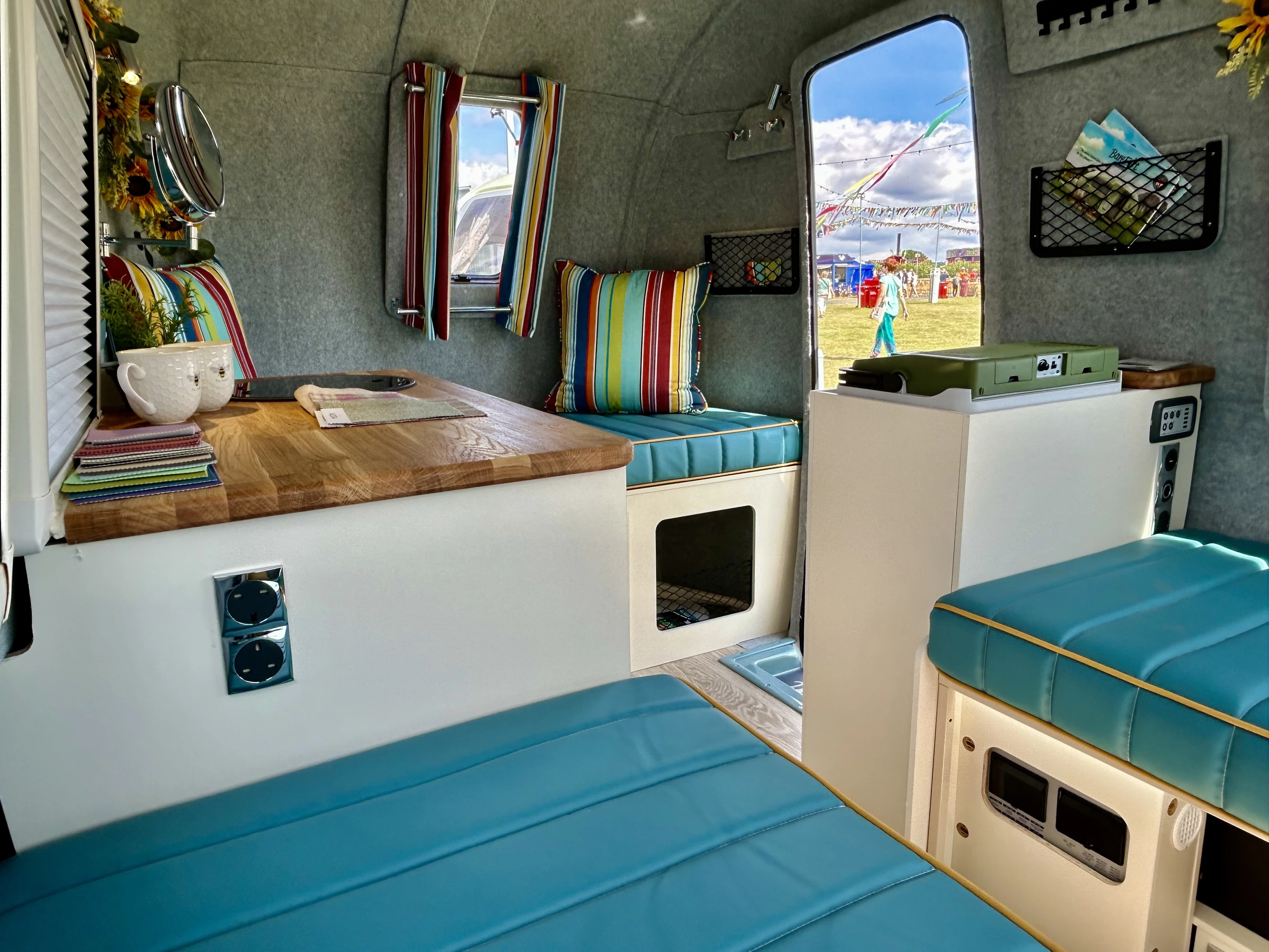 The Bothy includes a U-sofa rear dinette/convertible beds, a split central kitchen and a front sofa bench/bed