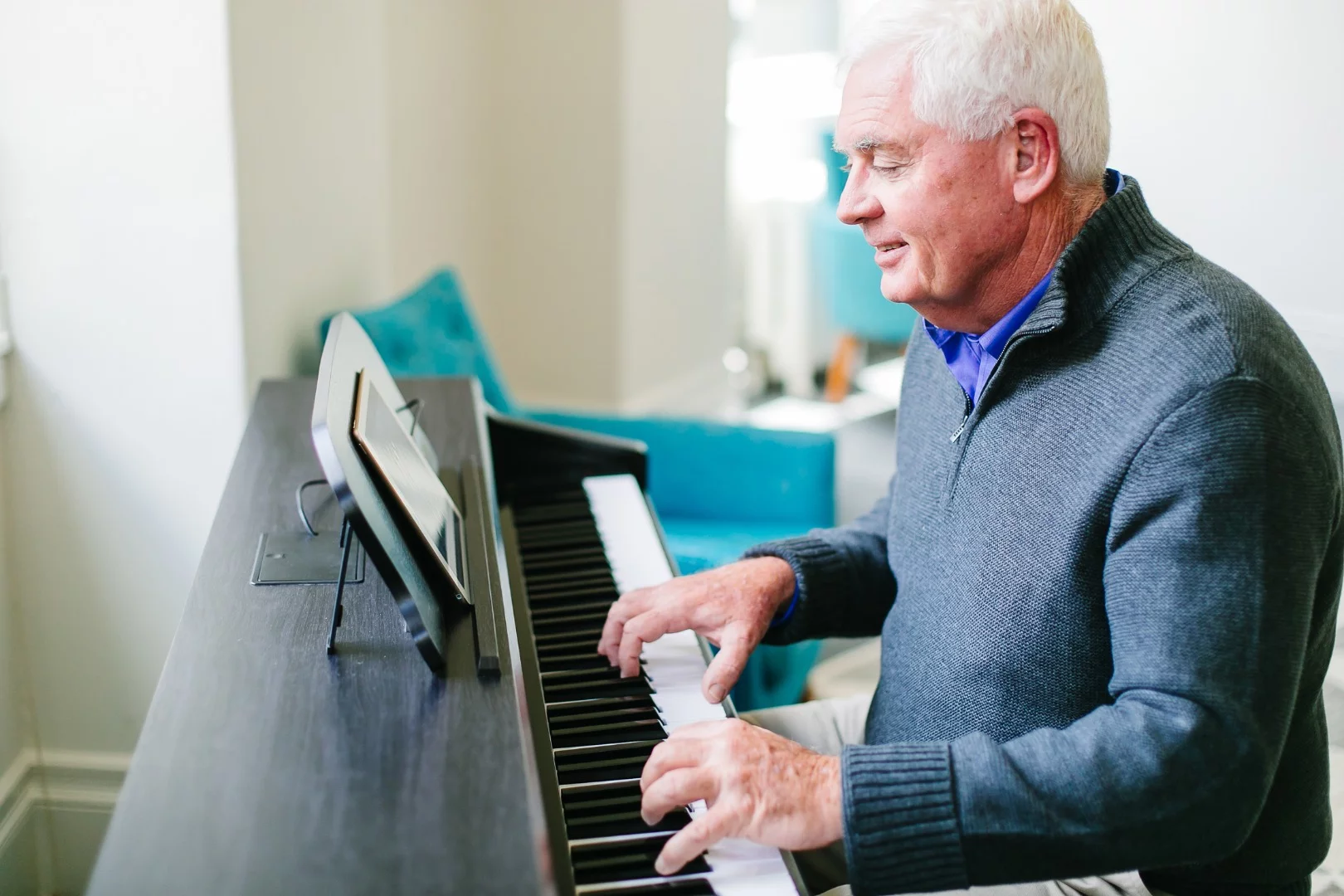 Students young or old learn using a free iOS/Android app that's synced with an LED light system on the piano