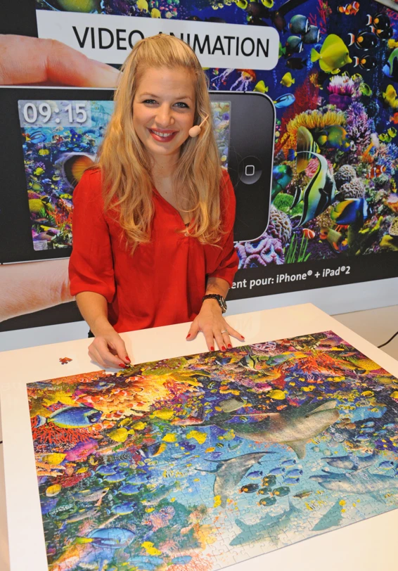 Actress Susan Sideropoulos completing a new AR jigsaw puzzle in Nuremberg, Germany recently