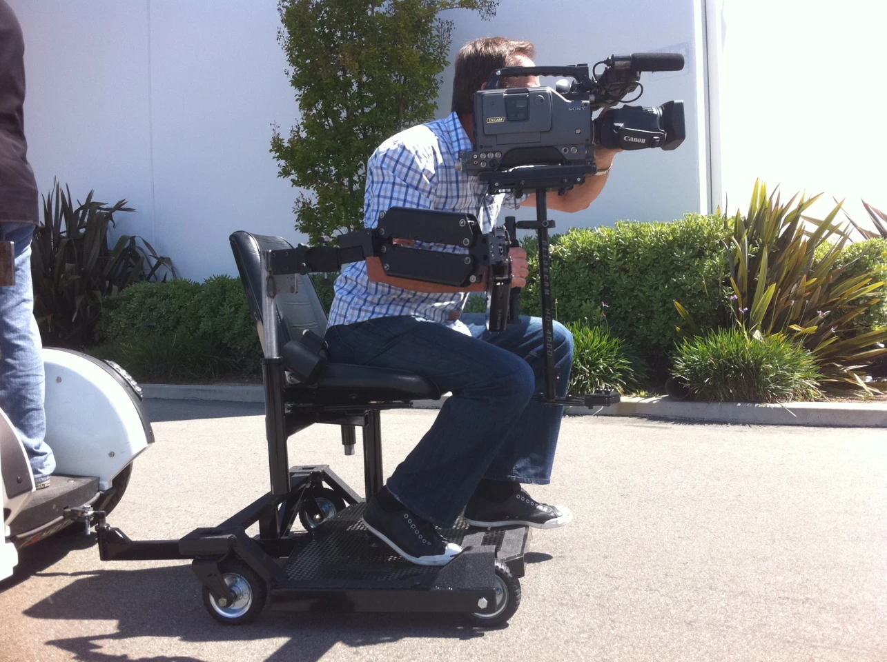The T3-41 trailer is pulled behind a regular T3 electric standup vehicle
