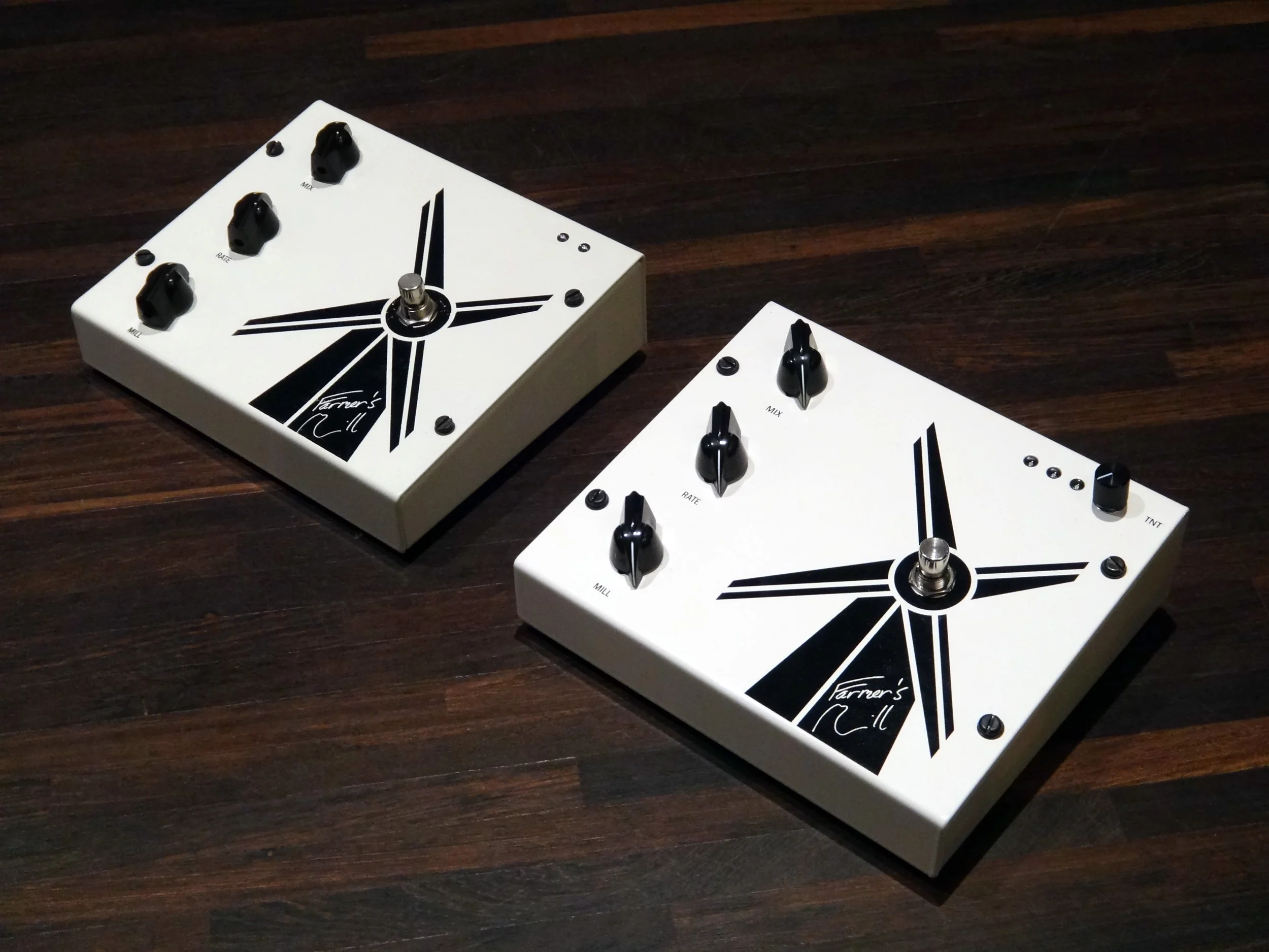 The original Farmer's Mill (left) next to the bigger and better second gen model