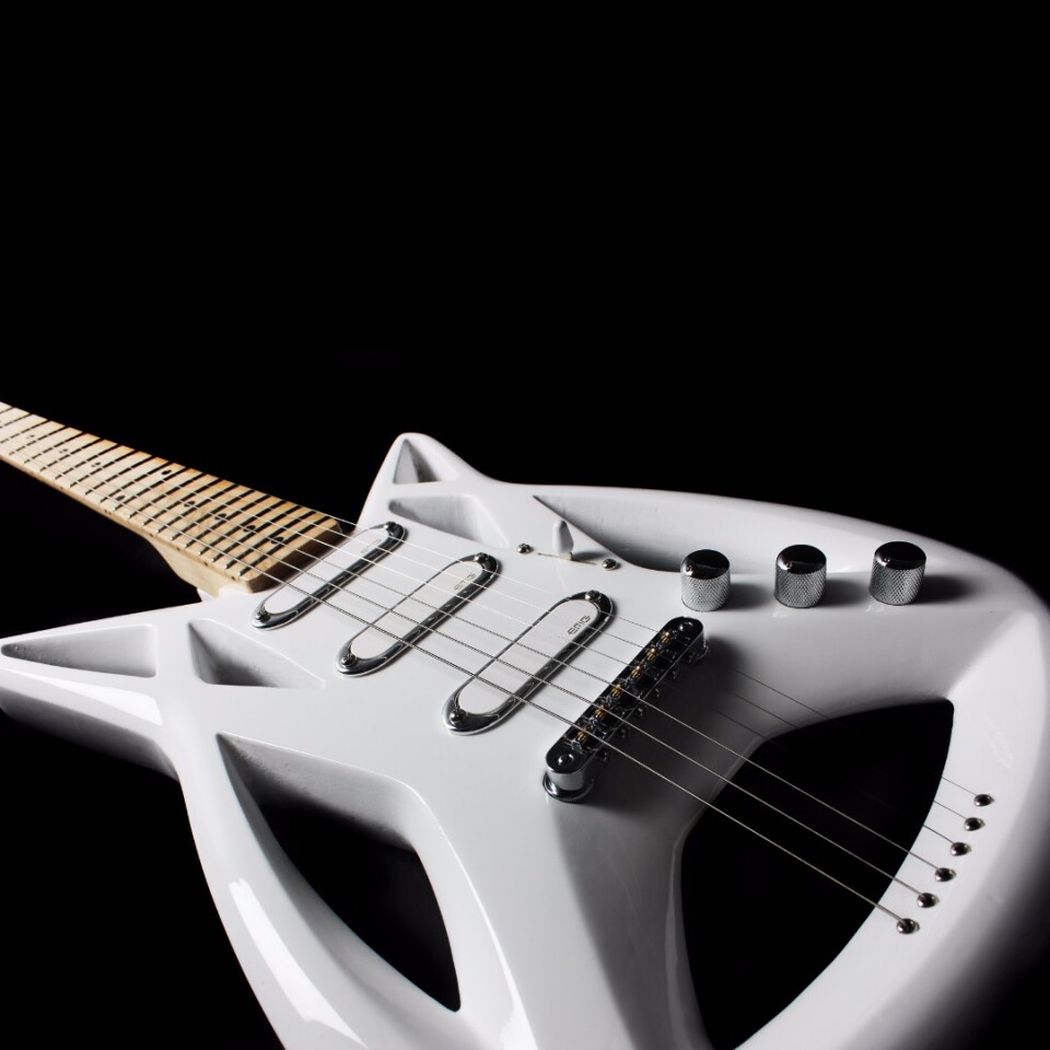 Mind the gap: The Eagle's strings get some air between the bridge and the back curve of the alder body